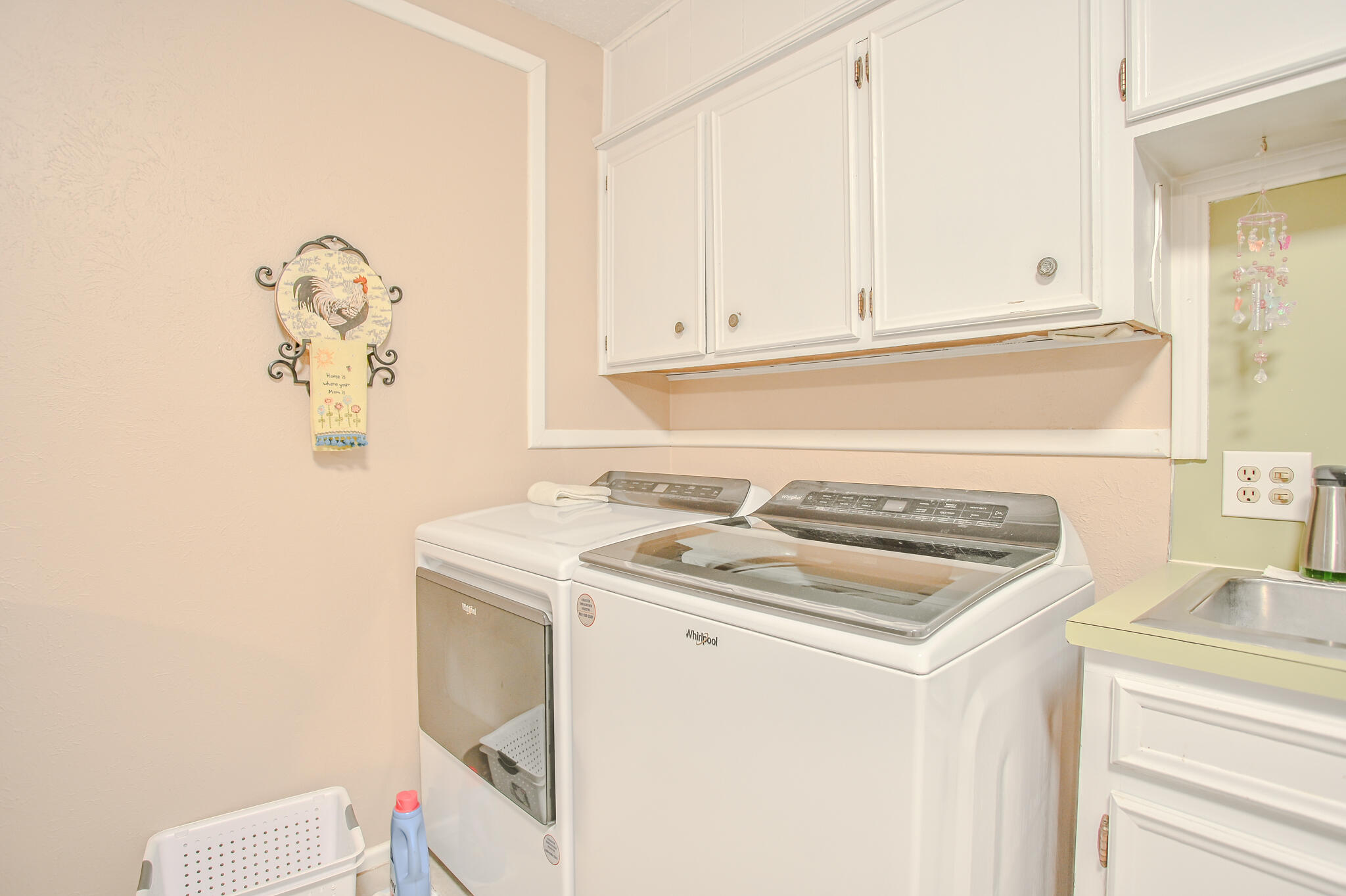 720 South 23rd Street Slaton, TX 79364 - Photo 32 of 46 a utility room with dryer and washer