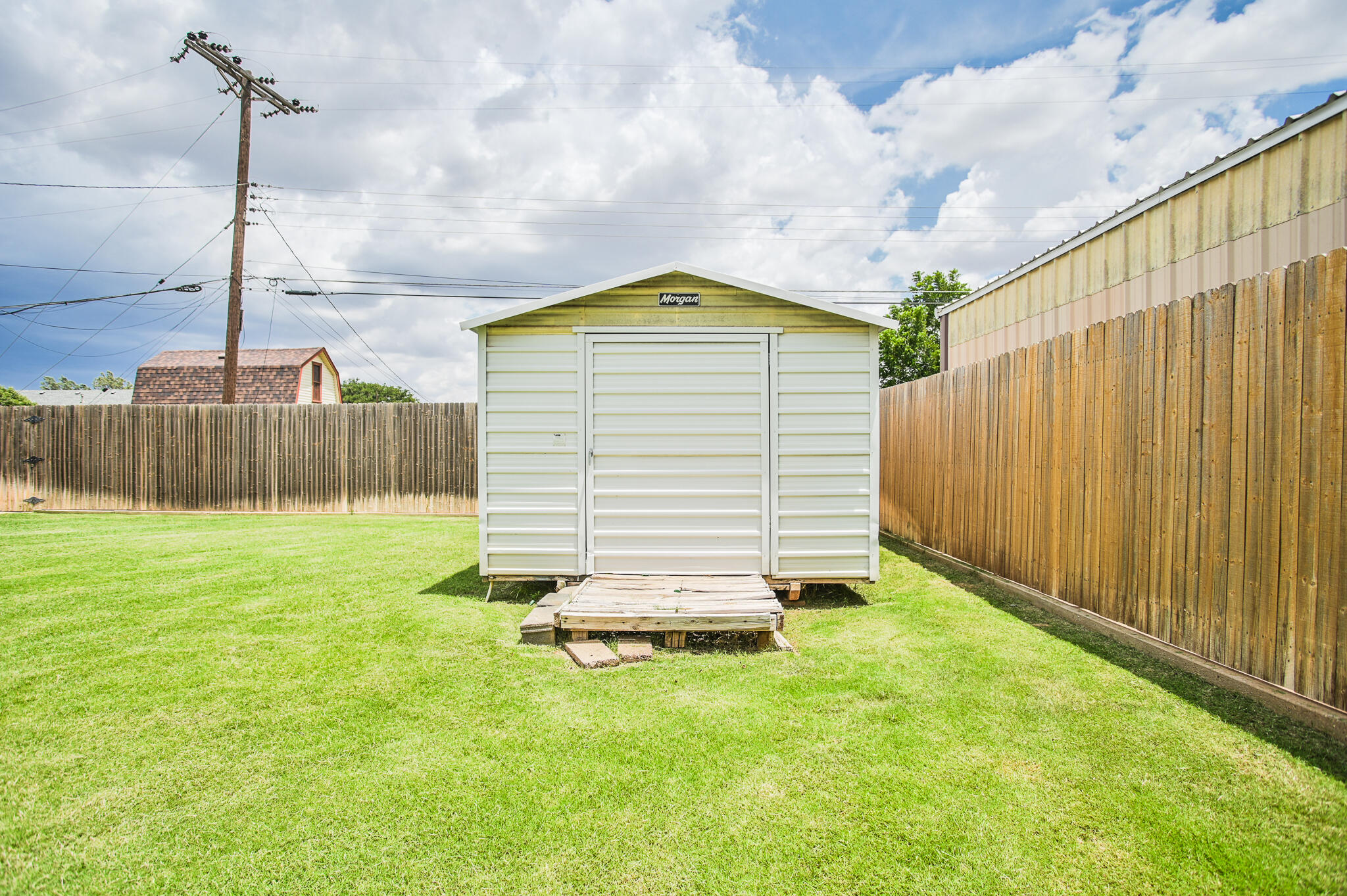 720 South 23rd Street Slaton, TX 79364 - Photo 42 of 46 a bathroom with a sink and garden