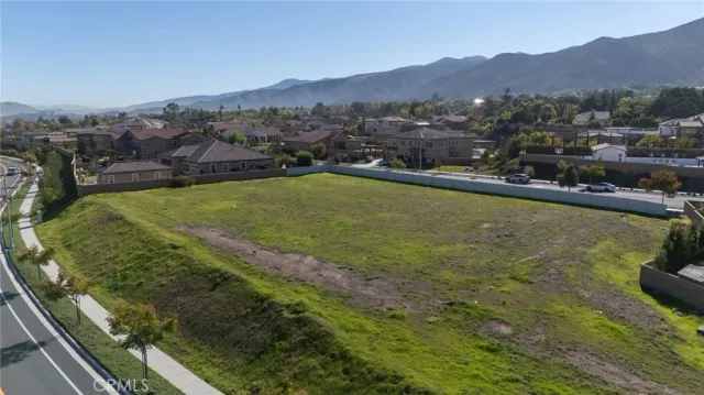 a view of a lake with a yard