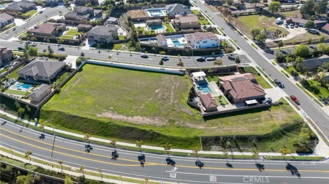 a view of swimming pool with outdoor seating and yard