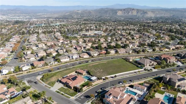 an aerial view of residential building and trees