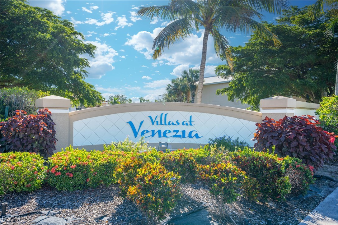 4172 Castilla Circle, Unit 203 Fort Myers, FL 33916 - Photo 17 of 37 a sign on the side of the road
