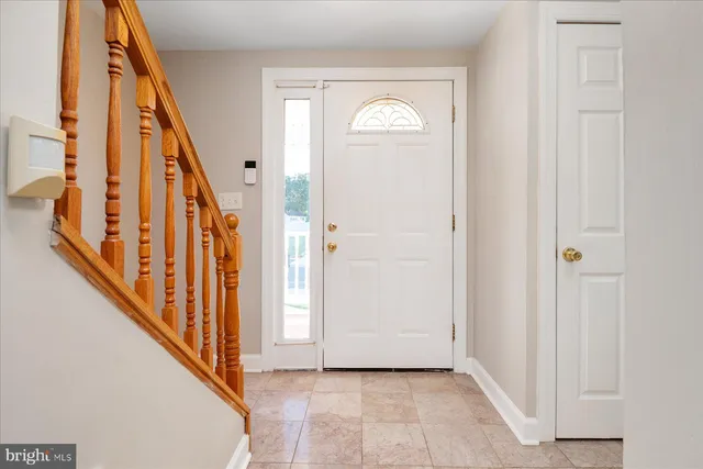 a view of an entryway with staircase