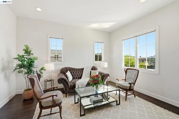 a bathroom with a double vanity sink mirror and toilet
