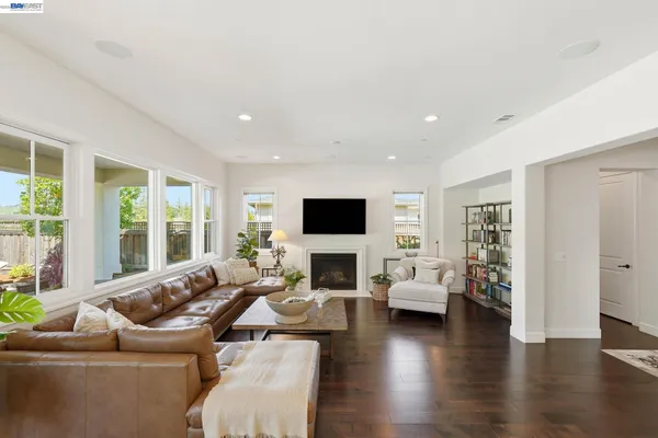 a bathroom with double vanity sink and a mirror