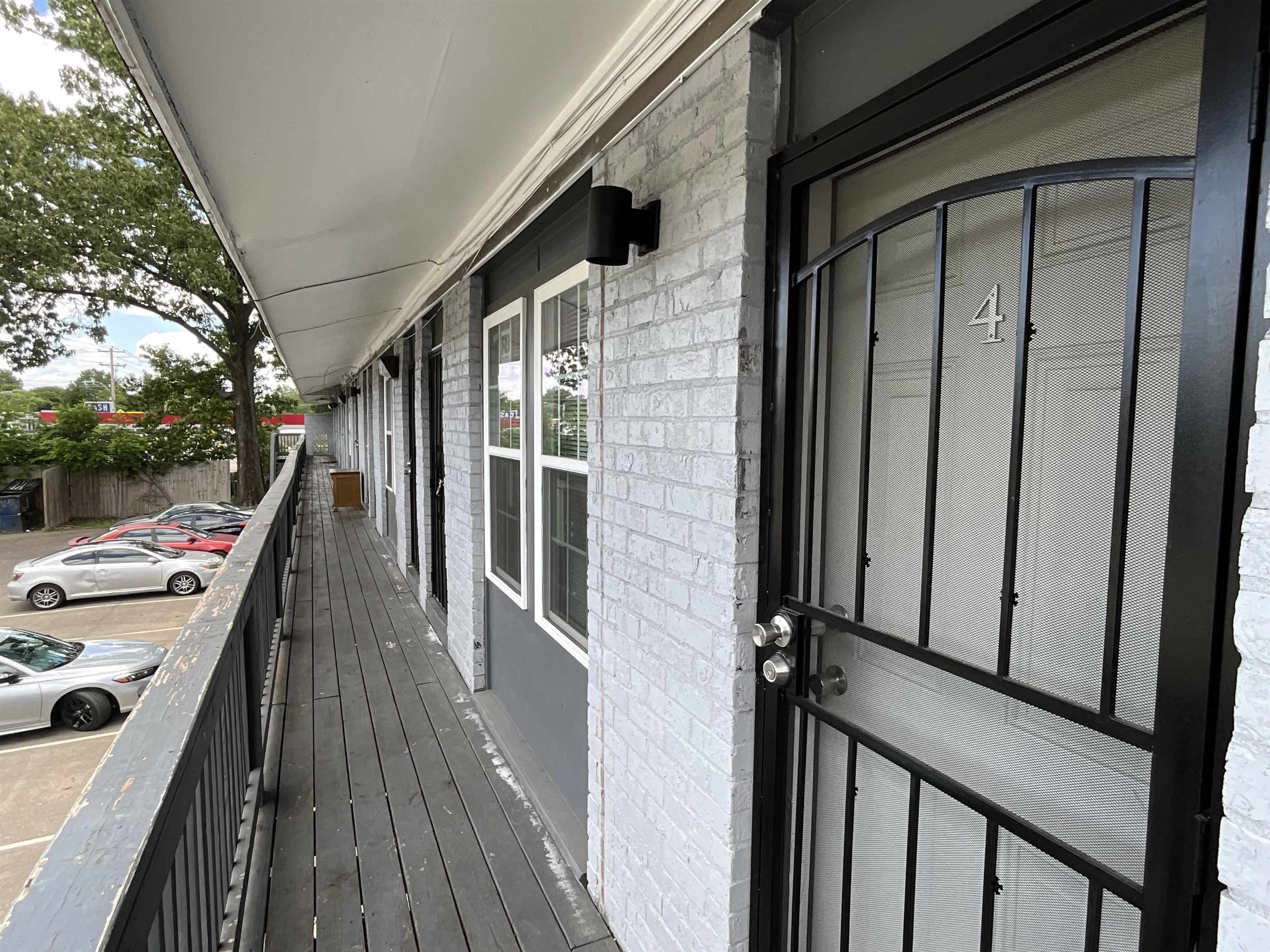 4455 Macon Road, Unit 4 Memphis, TN 38122 - Photo 1 of 11 a view of balcony and deck