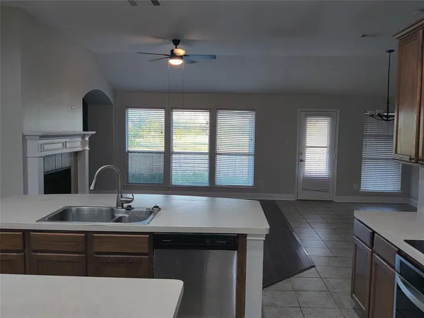 a kitchen with a sink and a window