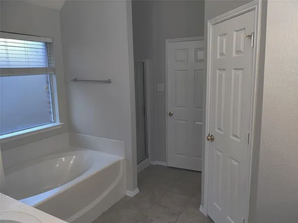 a bathroom with a bathtub