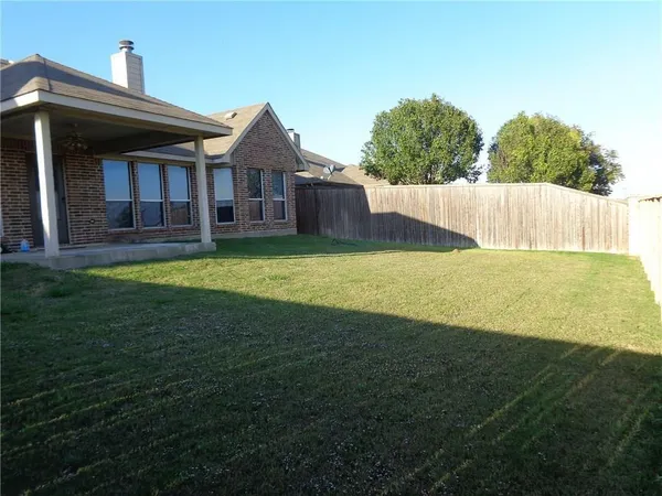 a view of a house with a garden