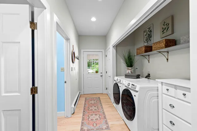 a utility room with dryer and washer
