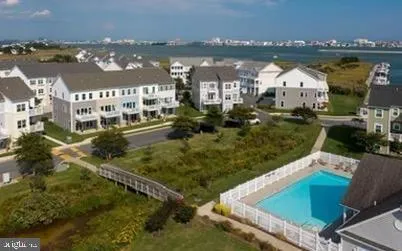 an aerial view of a house with outdoor space