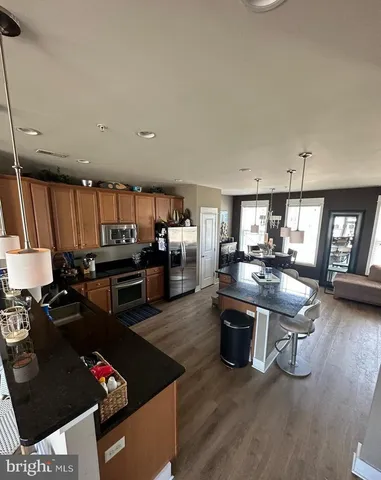 a kitchen with lots of counter top space and appliances