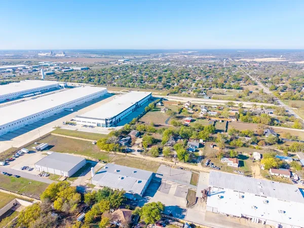 an aerial view of residential building and lake view
