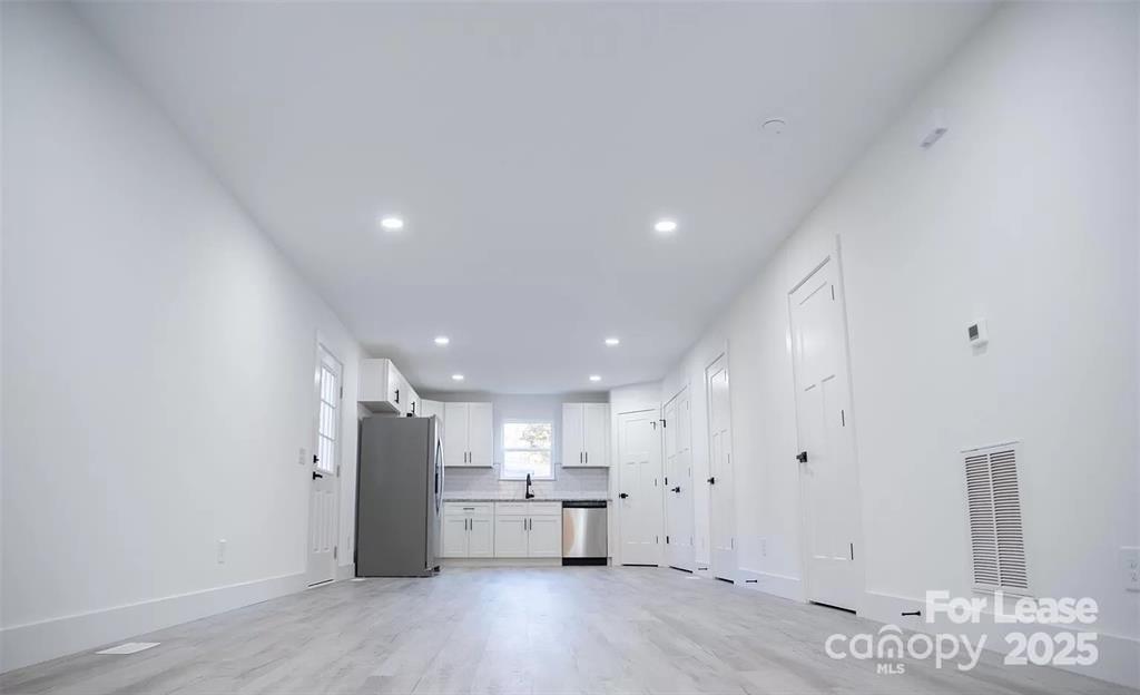 603 Edna Graves Way, Unit A Cherryville, NC 28021 - Photo 9 of 20 a view of kitchen and kitchen with sink