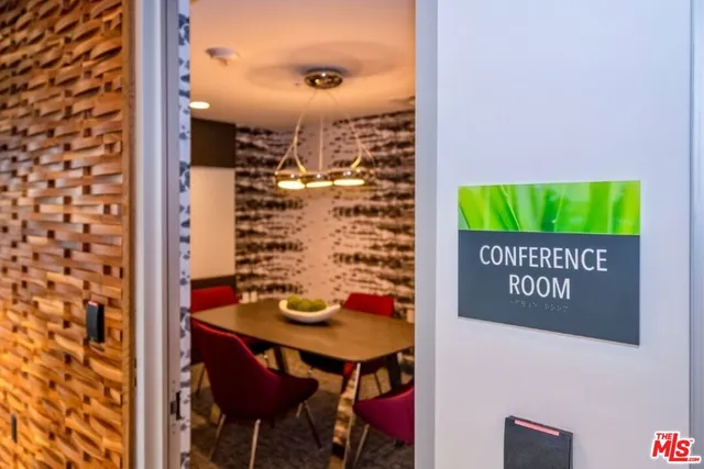 a view of a swimming pool with a lounge chairs