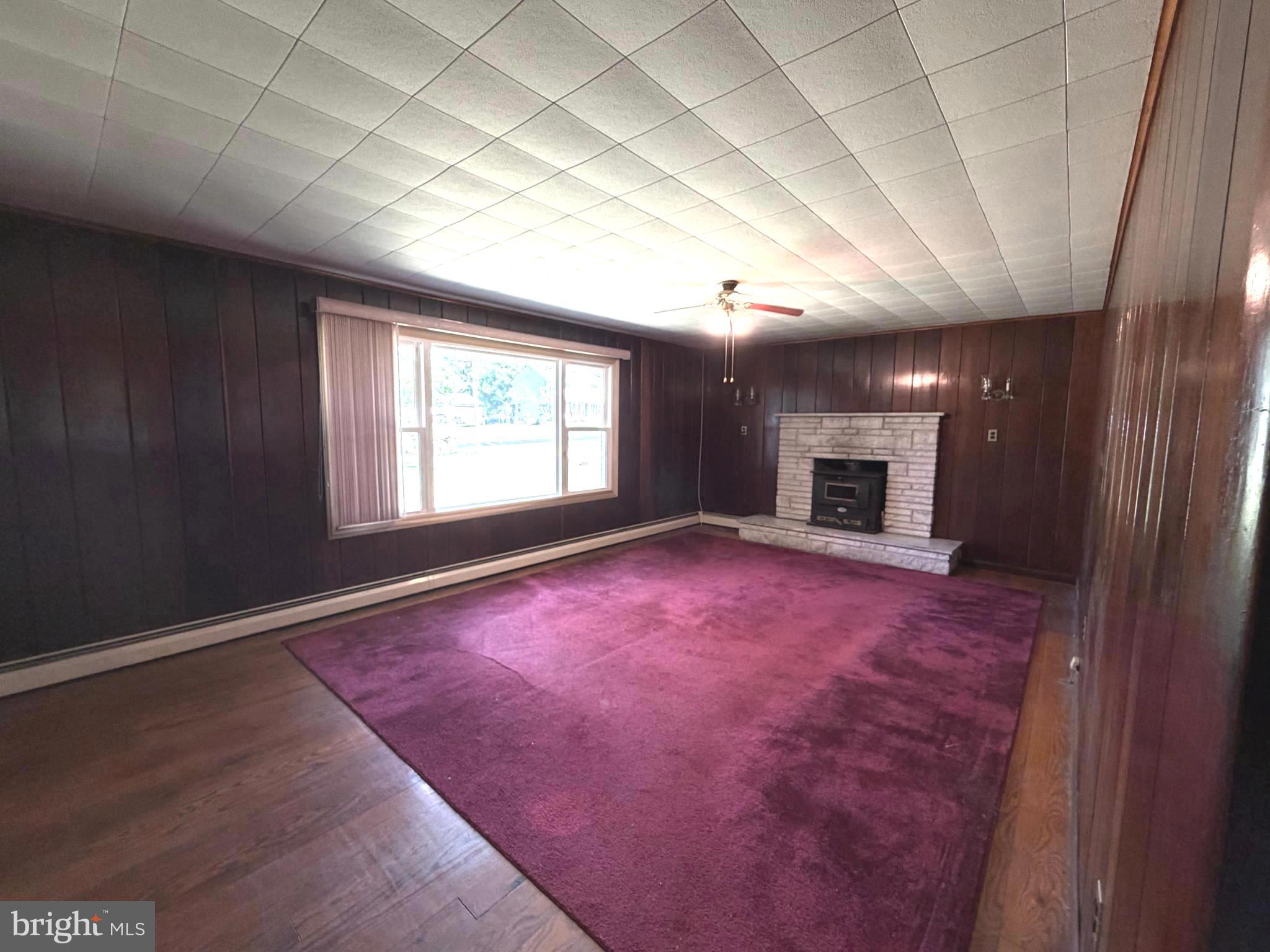 433 Juliustown Pemberton Road Juliustown, NJ 08022 - Photo 9 of 26 liv rm w new picture window & wood burning stove
