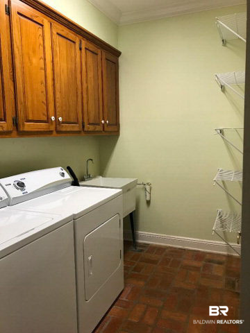 401 Potters Mills Road Daphne, AL 36526 - Photo 21 of 28 For Sale: 401 Potters Mill Avenue, Daphne, AL 36526 Laundry Room
