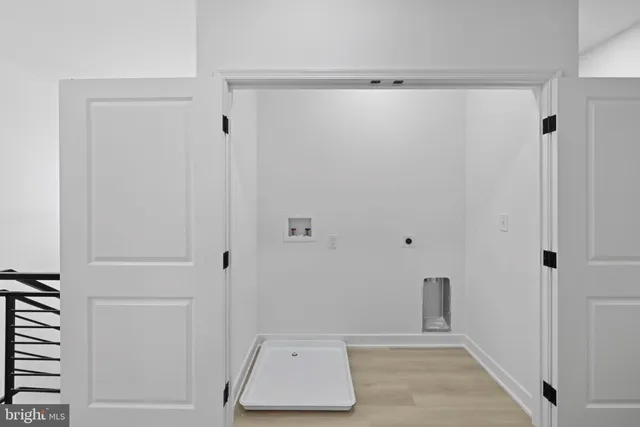 a view of a hallway with a white walls