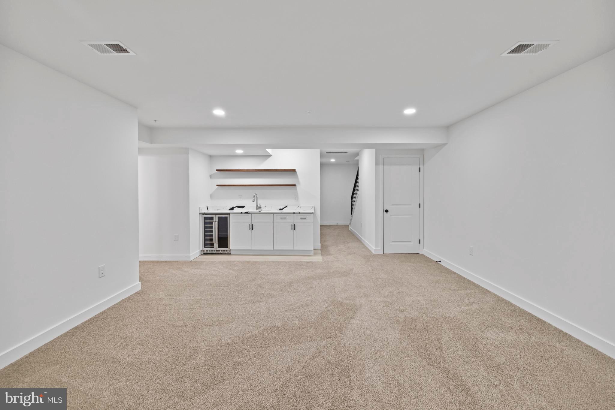235 Brock Bridge Road Laurel, MD 20724 - Photo 23 of 59 a view of a kitchen with refrigerator and window