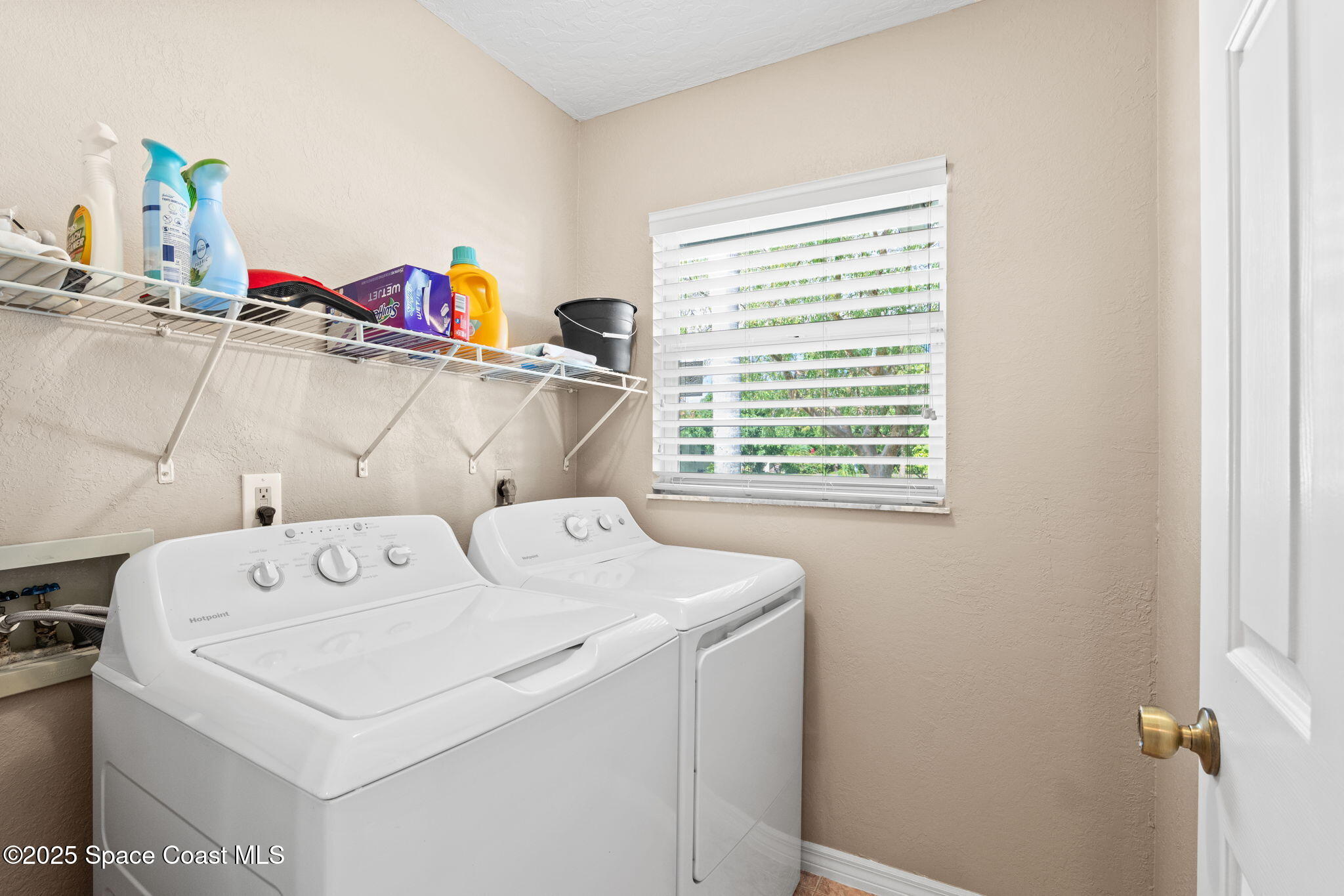 441 Southwest Avocado Avenue Sebastian, FL 32958 - Photo 17 of 30 a utility room with dryer and washer