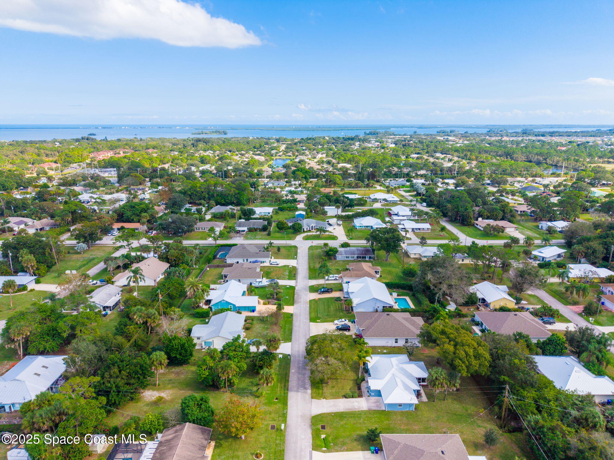 441 Southwest Avocado Avenue Sebastian, FL 32958 - Photo 29 of 30 an aerial view of residential building and green space