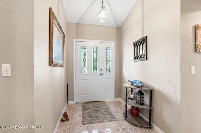 a view of room with window and hardwood floor