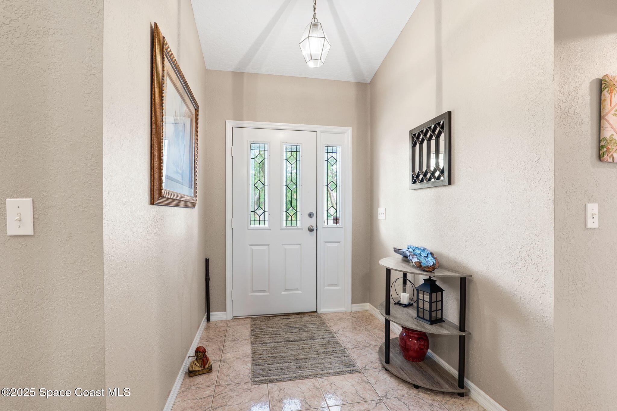 441 Southwest Avocado Avenue Sebastian, FL 32958 - Photo 4 of 30 a view of room with window and hardwood floor
