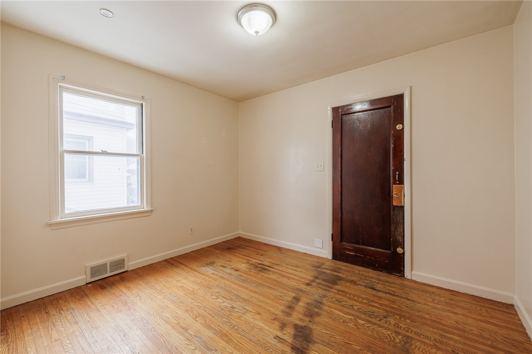 84 Jerold Street Rochester, NY 14609 - Photo 12 of 25 First Floor 2nd Bed Room - Lead to 3 Seasons Room