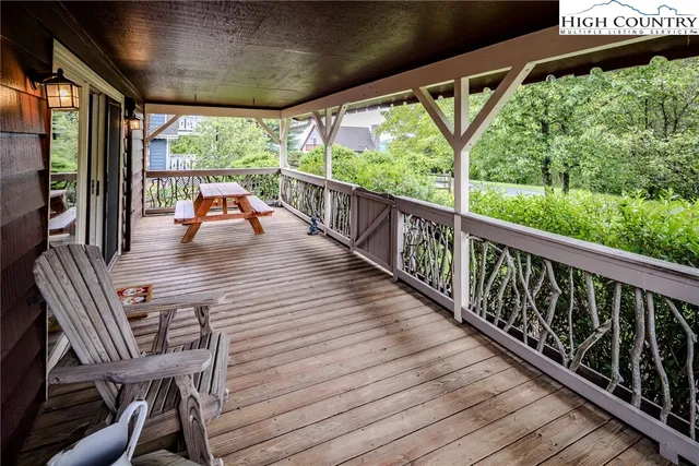 a view of balcony with furniture