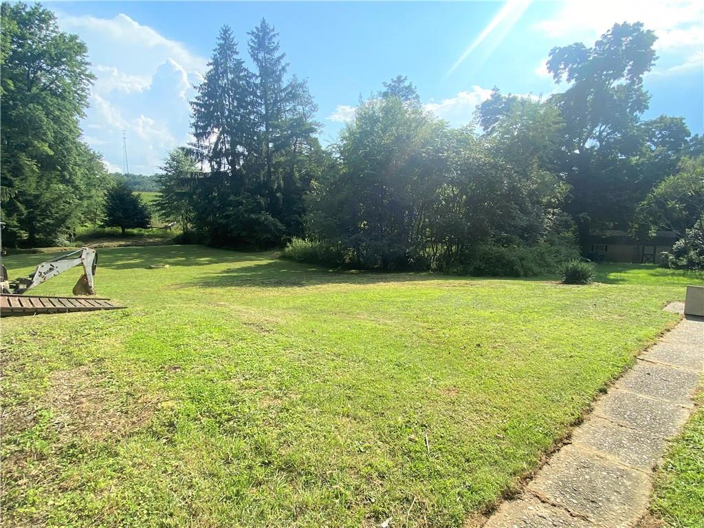102 Srader Grove Road Freeport, PA 16229 - Photo 21 of 21 a view of a swimming pool with a yard