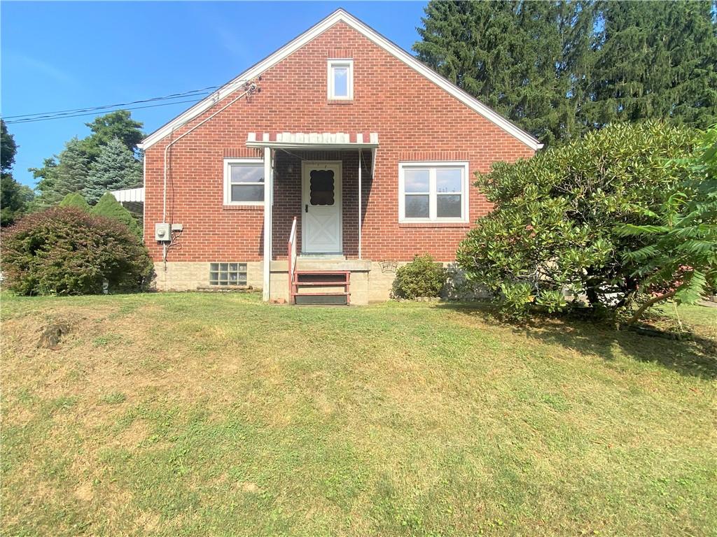102 Srader Grove Road Freeport, PA 16229 - Photo 4 of 21 a front view of a house with garden