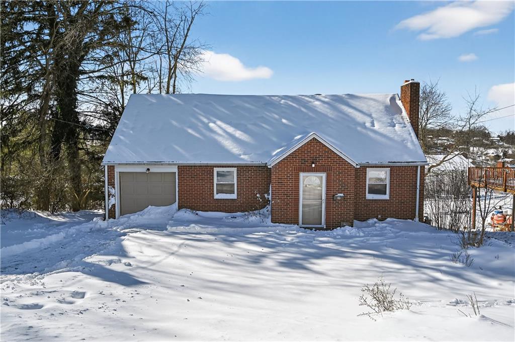 19 Locust Lane Upper St. Clair, PA 15241 - Photo 1 of 24 a view of a house with a yard