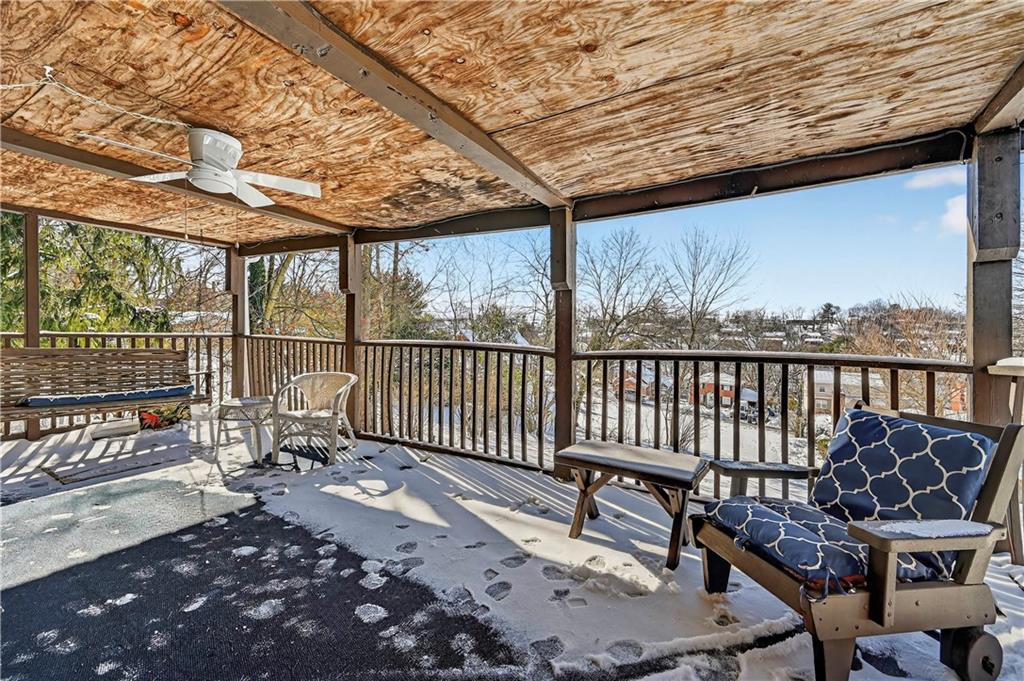 19 Locust Lane Upper St. Clair, PA 15241 - Photo 11 of 24 a balcony with wooden floor and outdoor seating