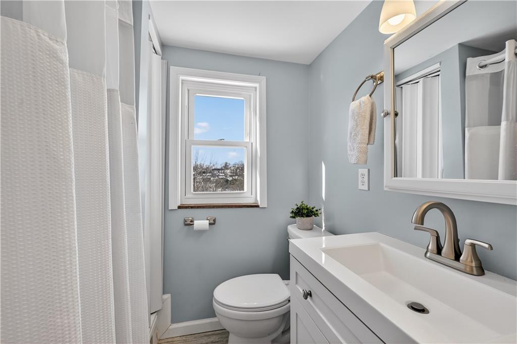 19 Locust Lane Upper St. Clair, PA 15241 - Photo 20 of 24 a bathroom with a sink toilet and shower