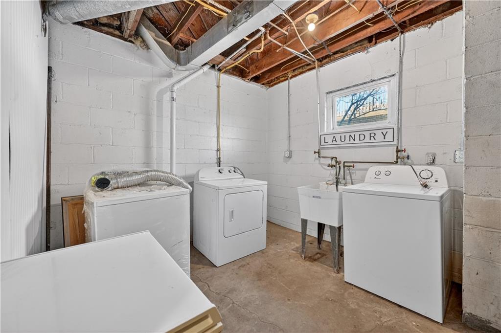 19 Locust Lane Upper St. Clair, PA 15241 - Photo 22 of 24 a utility room with dryer and washer