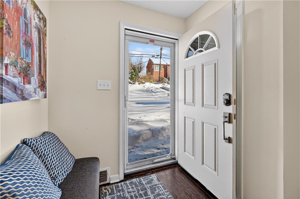 19 Locust Lane Upper St. Clair, PA 15241 - Photo 4 of 24 a room that has a window and a rug