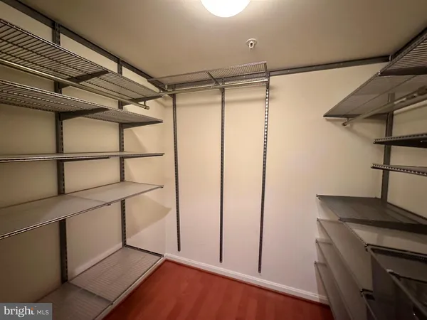 a view of a room with racks on the wall