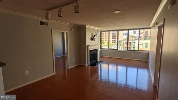 a view of entryway with wooden floor