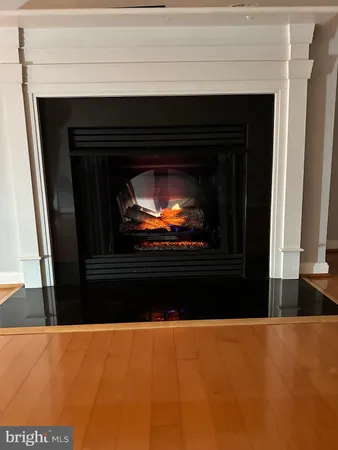 a living room with a fireplace