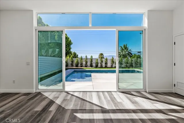 a view of a living room and front door