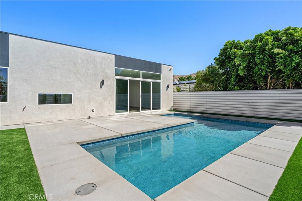 66423 San Marcus Road Desert Hot Springs, CA 92240 - Photo 22 of 28 a view of a backyard with sitting area