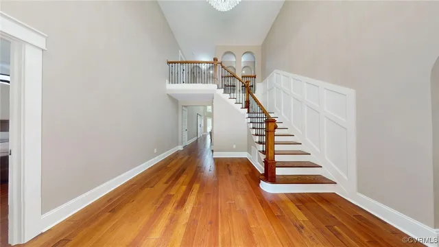 a view of entryway with wooden floor