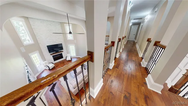 a view of an entryway with wooden floor