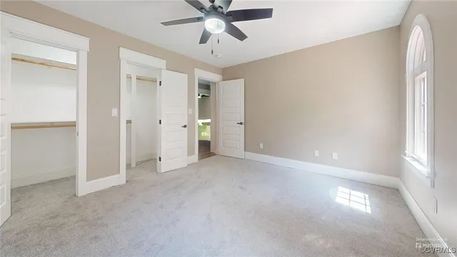 a view of an empty room and window