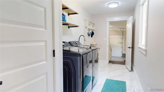 a kitchen with a refrigerator and a sink