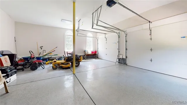 a view of a room with lots of gym equipment