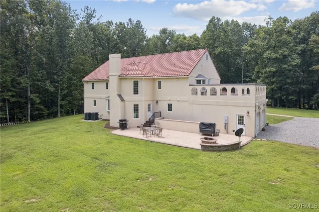 an aerial view of a house with garden