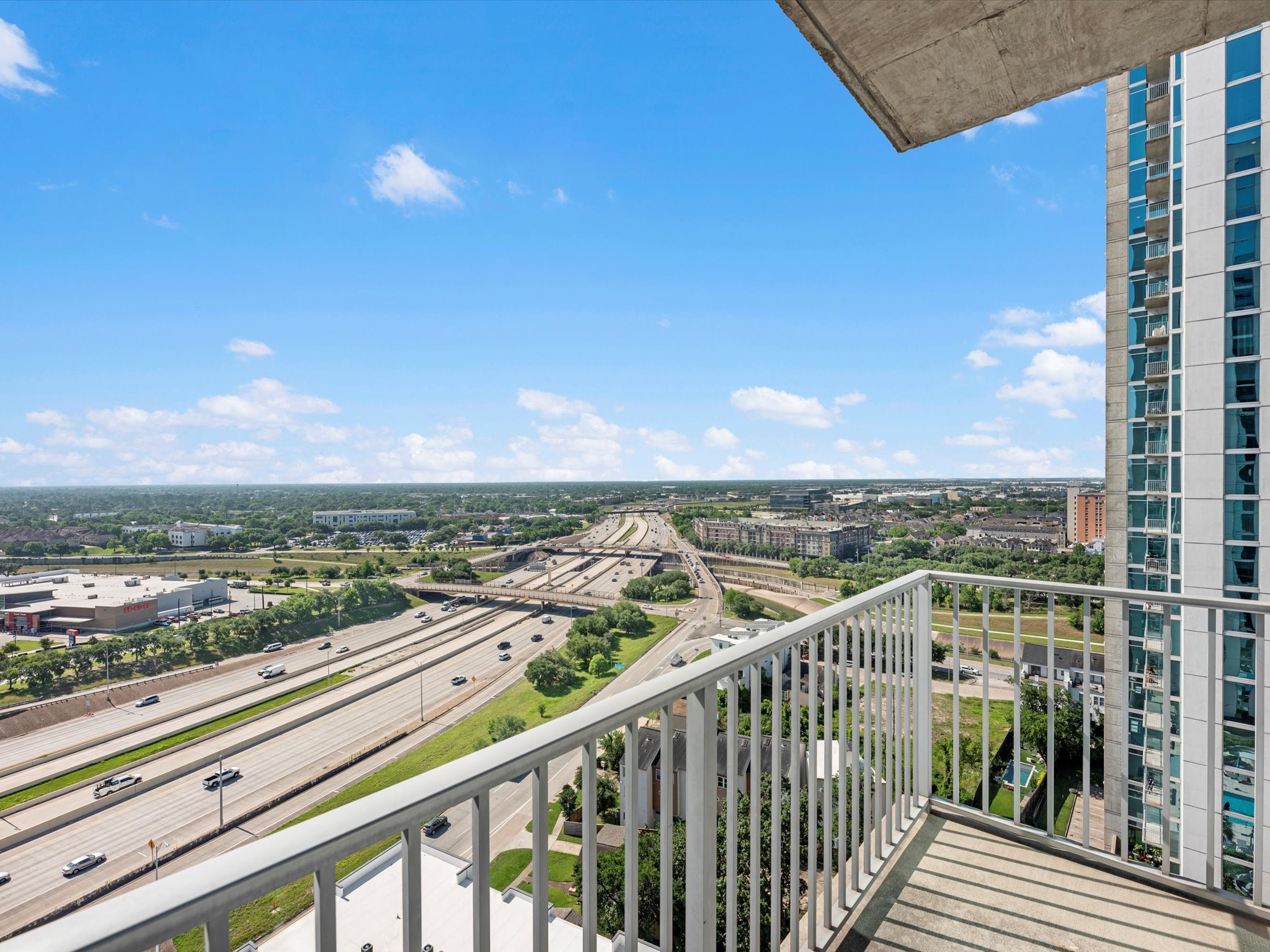 5925 Almeda Road, Unit 11702 Houston, TX 77004 - Photo 10 of 35 a view of a city from a balcony