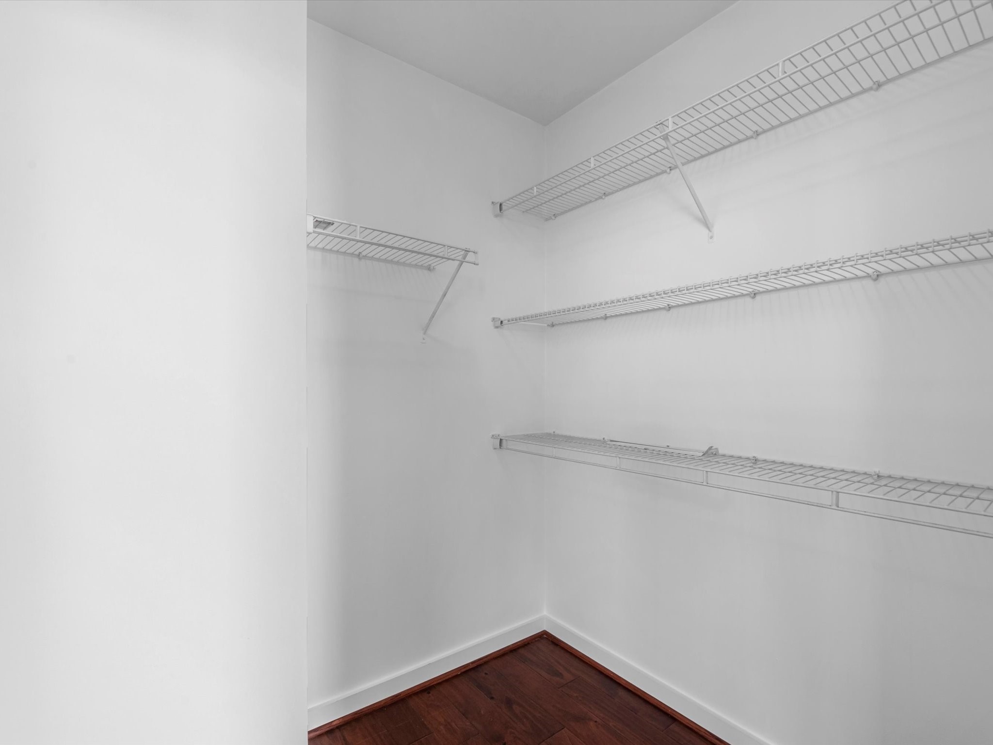 5925 Almeda Road, Unit 11702 Houston, TX 77004 - Photo 12 of 35 a view of a room with racks on the wall