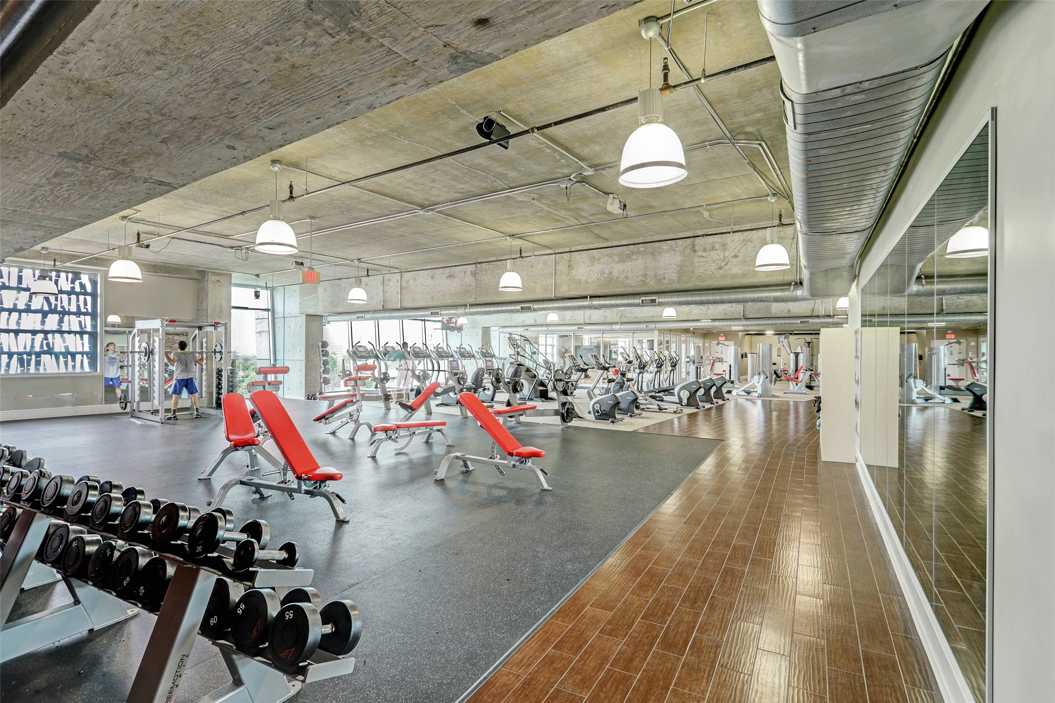 5925 Almeda Road, Unit 11702 Houston, TX 77004 - Photo 30 of 35 a room with lots of gym equipment